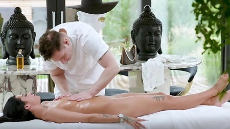 Gorgeous brunette Chloe Heart gets oiled up, massaged, eaten out and fucked well